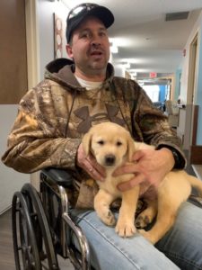 Puppy visit with residents